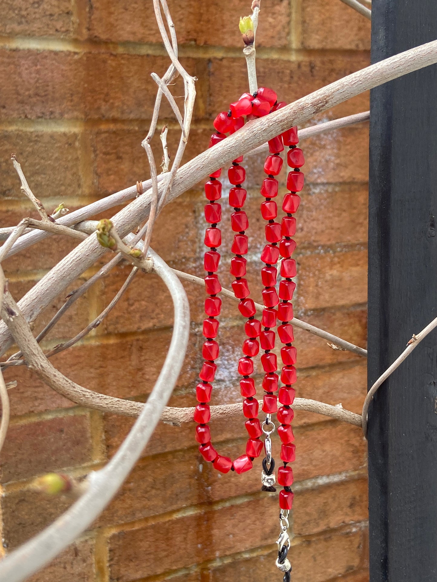 Red moon glow eyeglass chain