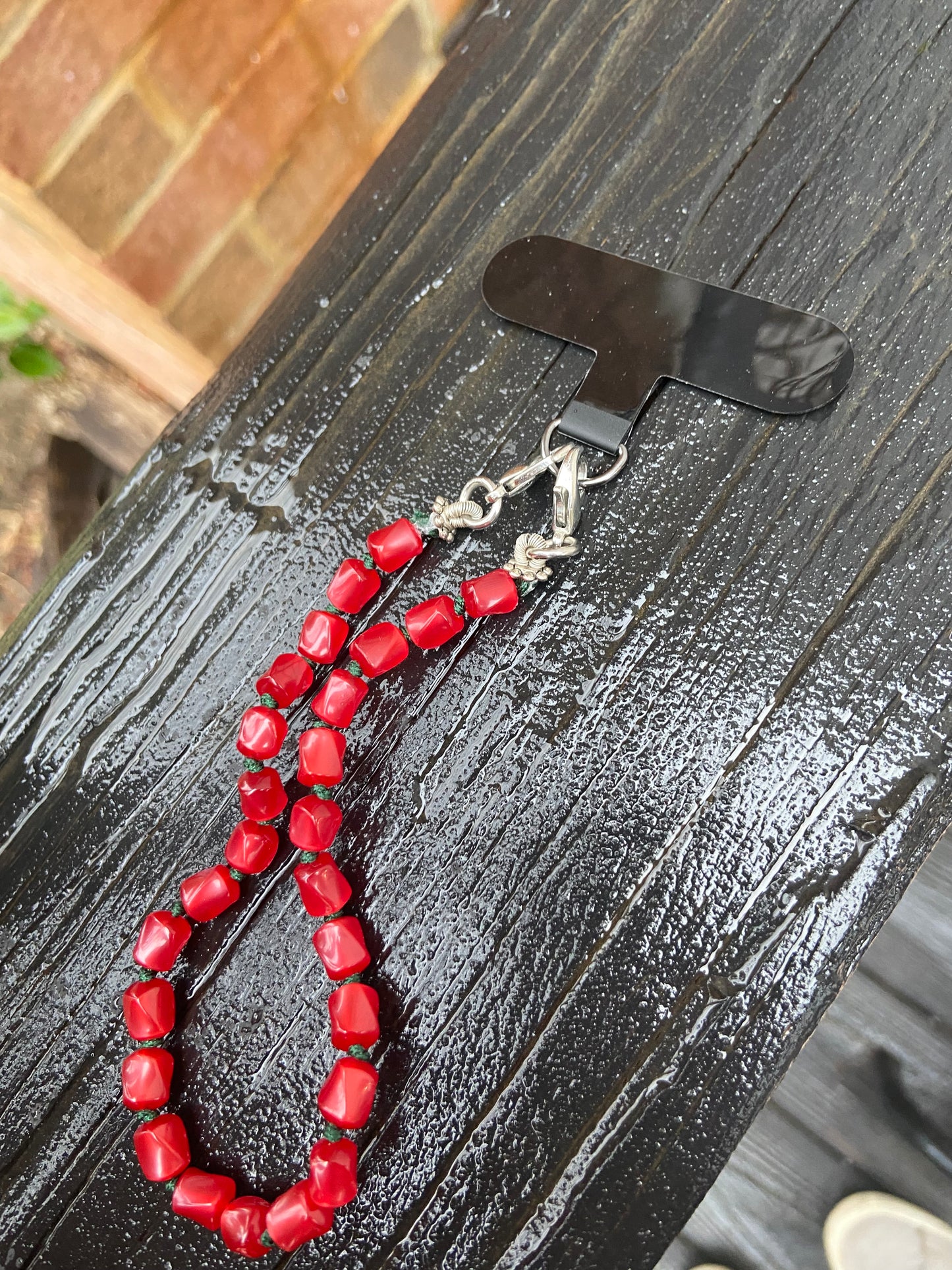 Red moonglow phone strap