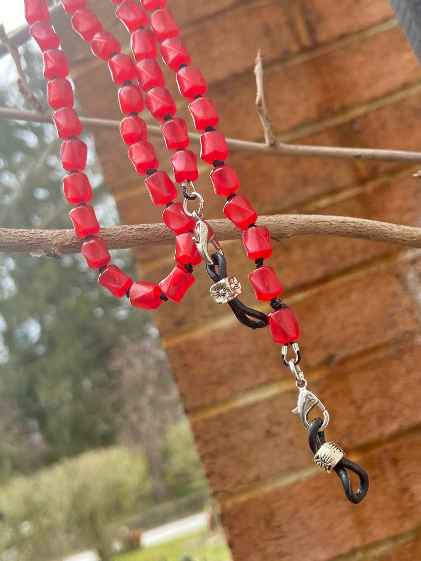 Red moon glow eyeglass chain