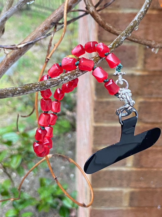 Red moonglow phone strap